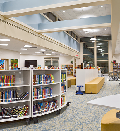 Library furnished with VS Shift+ furniture and HOKKI Stool