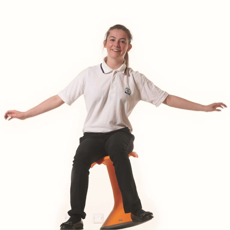 Girl on a HOKKI Stool - an Ideal SEN Furniture option